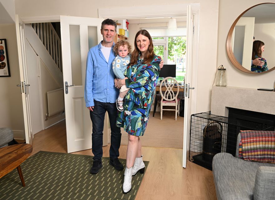 Leslie Ann Horgan with her husband Kevin Burke and daughter Juliette, at their home in Dublin 9. Photo: Bryan Meade